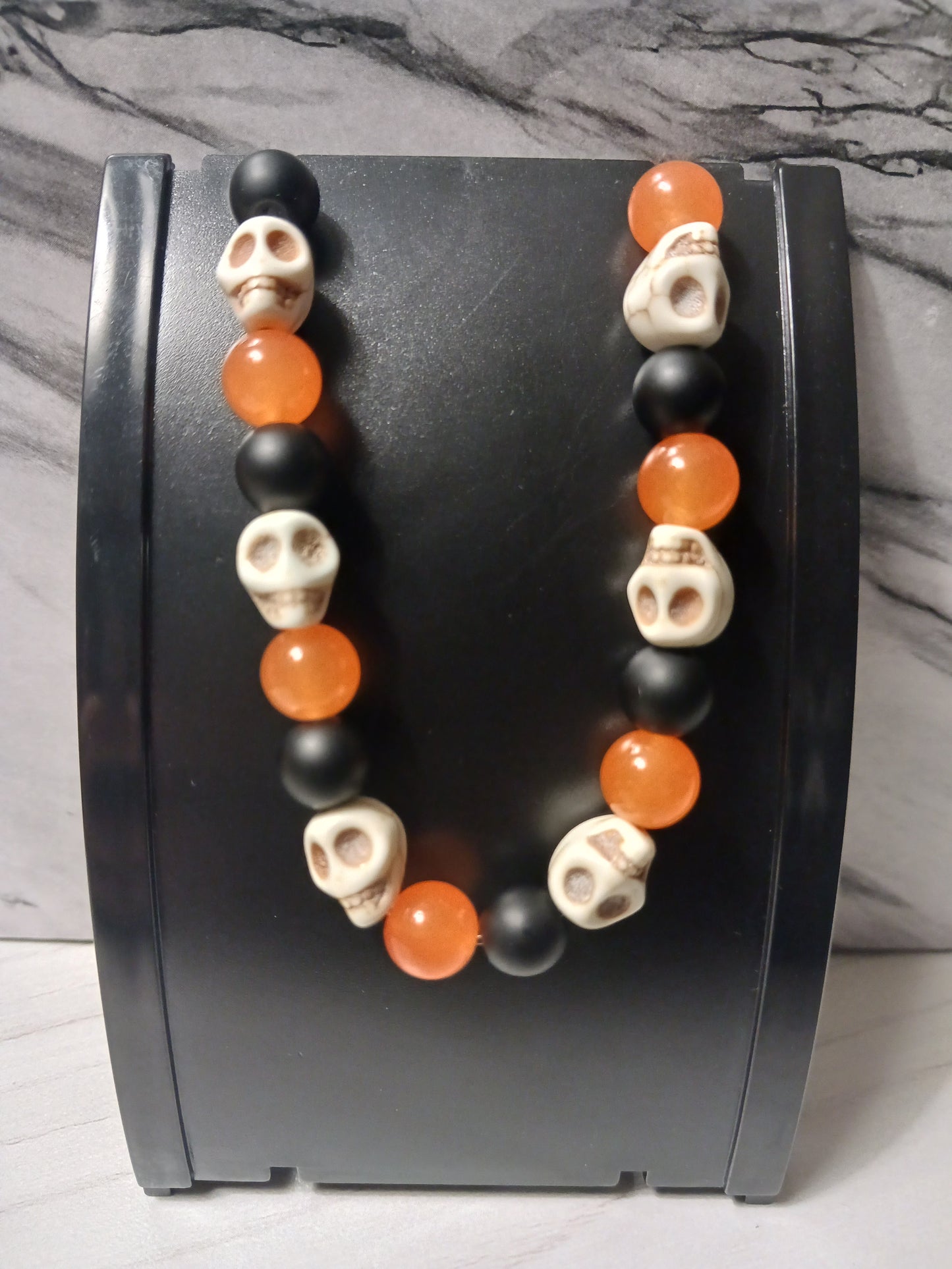Black Onyx/Orange Chalcedony/White Skull Bracelet