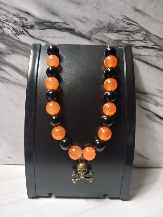 Black Agate/Orange Chalcedony/Brass toned Skull Crossbones Charm Bracelet