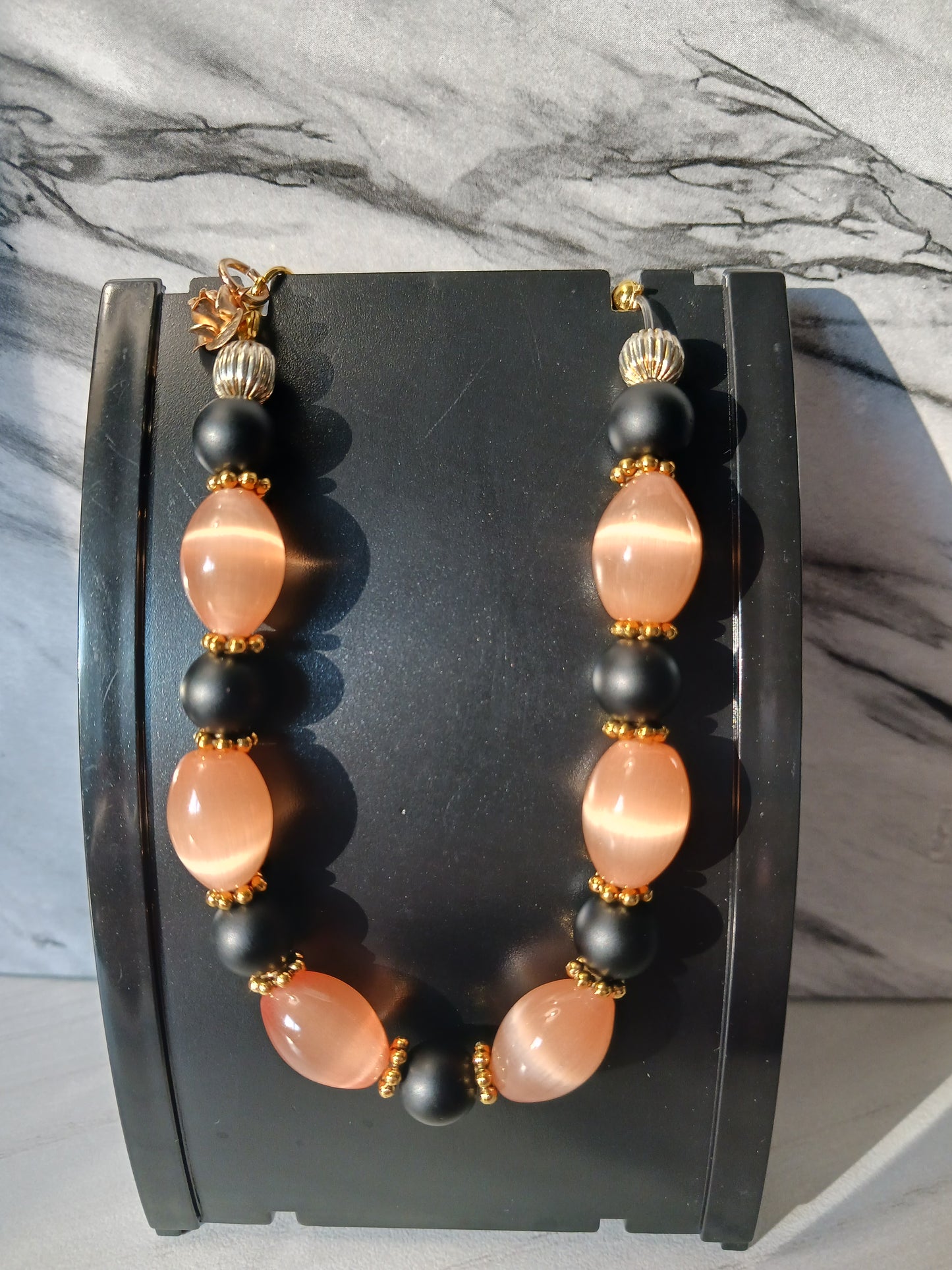 Pearlescent Orange/Black Onyx/Gold Rose Bracelet